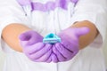 Women& x27;s hands hold two shaving razor for epilation on a blue background Royalty Free Stock Photo