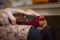 Women& x27;s hands making a shoe by hand Royalty Free Stock Photo