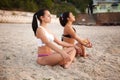 Women in Yoga meditation pose Royalty Free Stock Photo