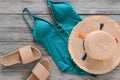 Womens clothing, accessories, shoes straw hat, blue green swims Royalty Free Stock Photo