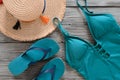 Womens clothing, accessories, shoes straw hat, blue green swims Royalty Free Stock Photo