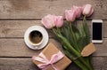 Womens day morning - tulips, present and coffee Royalty Free Stock Photo