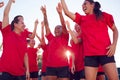 Womens Football Team Celebrating Winning Soccer Match On Outdoor Astro Turf Pitch