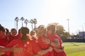 Womens Football Team In Huddle Having Motivational Pep Talk Before Soccer Match Royalty Free Stock Photo