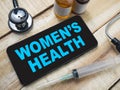 Womens health, text words typography written on smart phone, health and medical