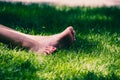 Womens legs on grass
