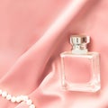 Womens perfume. Aroma beauty product, personal care concept. glass flask, female toilet water bottle on pink background