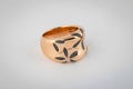 Womens Rose Gold Ring With Flower Shaped Stones Isolated On White Background