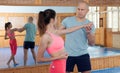 Womens self-defense workout with personal trainer, fighting training in gym Royalty Free Stock Photo