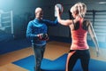 Womens self-defense workout with personal trainer Royalty Free Stock Photo