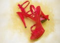 Womens shiny patent red stiletto sandals on yellow background painted by watercolor