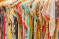 Womens summer clothes hanging on rail