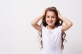 Wonder. Beautiful little girl. White background