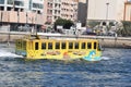 Wonder bus running in Dubai creek Royalty Free Stock Photo