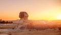 Wonder of world Sphinx and pyramids Giza, Egypt sunset sky Royalty Free Stock Photo