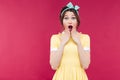 Wondered pinup girl in yellow dress with mouth opened Royalty Free Stock Photo