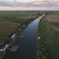 Wonderful aerial shot of fishing huts at sunset near Comacchio Royalty Free Stock Photo