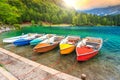Wonderful alpine landscape and colorful boats,Lake Fusine,Italy,Europe