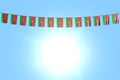 wonderful any occasion flag 3d illustration - many Burkina Faso flags or banners hanging on rope on blue sky background