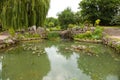 Wonderful artificial pond in city park Royalty Free Stock Photo