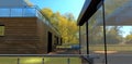 A wonderful autumn day. Sun glare plays on the terrace of a country-style sports house built in a minimalist style. Large