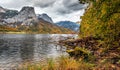 Wonderful Autumn landscape. Amazing Highmountain lake Grundsee and Mountain Backenstein on background. over the splendid Alpine