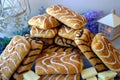 Wonderful biscuit cakes poured with chocolate stand on background