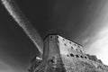 Wonderful black and white view from below of the ancient Orsini Fortress in the historic center of Sorano, Maremma, Tuscany, Italy