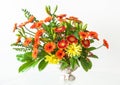 A Wonderful Bouquet of Mixed Colorful Gerberas in an Antique Vase.