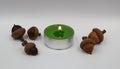 wonderful bright green candle and oak acorns. Autumn acorn decoration