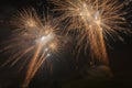 Wonderful cascade of lights created by the explosion of gilded fireworks Royalty Free Stock Photo