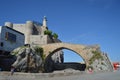 Wonderful Castle Lighthouse Santa Ana And Roman Bridge Dated In The 12th Century On The Promenade In Castrourdiales. August 27,