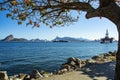 Wonderful city, city of Rio de Janeiro, Sugar Loaf and the oil and gas tower in the background, Offshore oil industry. Royalty Free Stock Photo