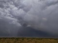 Wonderful clouds with rain and small rainbow in Rajasthan