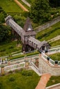 Wonderful covered wooden bridge by Dusan Jurkovic in Italian garden, baroque park in sunny summer day, renaissance chateau castle