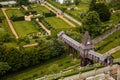 Wonderful covered wooden bridge by Dusan Jurkovic in Italian garden, baroque park in sunny summer day, renaissance chateau castle