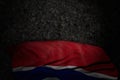 wonderful dark image of Gambia flag with big folds on dark asphalt with empty space for your content - any occasion flag 3d