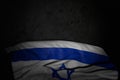 Wonderful dark image of Israel flag with large folds on black stone with empty place for your content - any occasion flag 3d