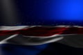 wonderful dark photo of Costa Rica flag lie on blue background with bokeh and free place for your text - any occasion flag 3d