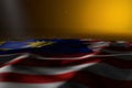 wonderful dark picture of Malaysia flag lie on yellow background with selective focus and empty space for your text - any occasion