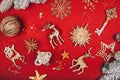 Wonderful different sparkling Christmas decorative toys on red background.