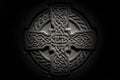 Wonderful embossed Celtic stone cross, full of details and textures in its elaborate carvings.