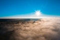 Wonderful foggy morning in the Ukrainian village on the Carpathian Mountains with sunshine Royalty Free Stock Photo