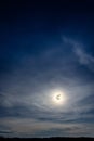 A wonderful full moon has descended over Ukrainian carpathians in blurry clouds