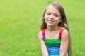 Wonderful girl sitting on the lawn Royalty Free Stock Photo