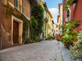 Wonderful glimpse of a colorful alley in the town of Mandello sul Lario Royalty Free Stock Photo