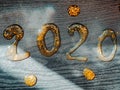 Wonderful Greeting card Happy New Year 2020. Creative Square holiday web banner or billboard with gold sequins 2020 written Royalty Free Stock Photo