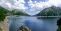 wonderful landscape in the mountains with a lake from a hydropower plant with a dam Royalty Free Stock Photo