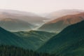 Wonderful  landscape in the mountains at sunrise. View of a scenic  forest hills. Golden Hour morning light. Effect warm natural l Royalty Free Stock Photo