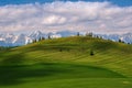Wonderful landscape with rolling meadows, terraced fields and rocky hills in the foothills. Royalty Free Stock Photo